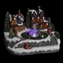 Village de noël scène fontaine avec enfants